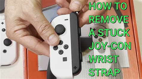 joy con wrist strap removal.